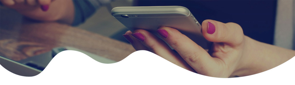 Photo of lady holding mobile phone